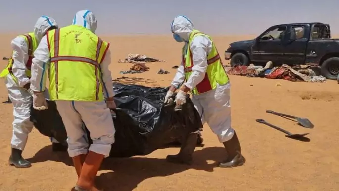 A picture of  65 migrants dead bodies